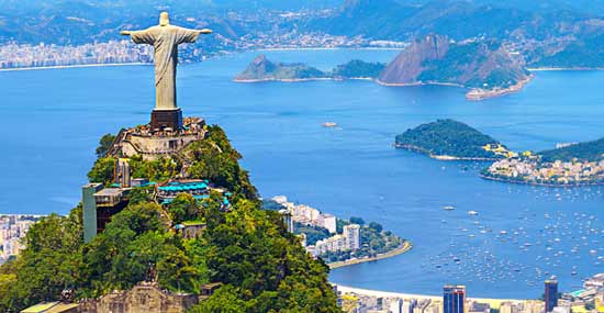 aerial view of corcovado mountain and christ the redeemer which is being visited by traveller after traveller as its one of the top tourist attractions of rio de janeiro