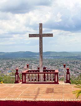 celebrating easter in cuba trinidad with cross ontop of hill