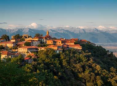 hilltop town in georgia signagni mountains in the bag and green foliage