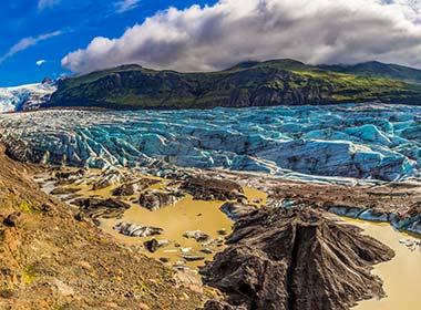 glacier and mountains with clouds in vatnajokull national park on a tour of iceland