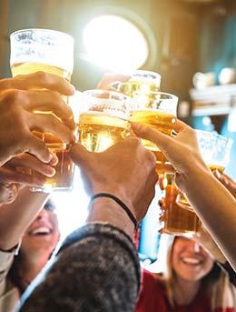 group of people drinking beer at jerusalem beer festival