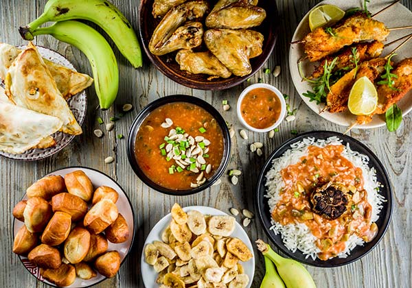 spread of typical traditional kenyan food on a table