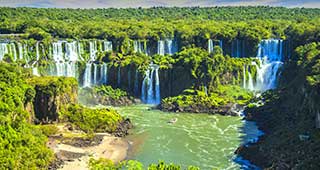 argentina's enormous iguazu falls in a bucket list destination for honeymoon travellers to south america and a landmarks to be in awe of the surroundings