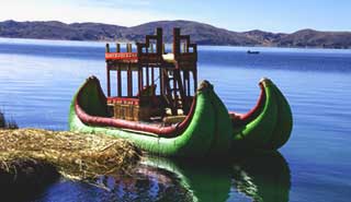 Travel group on holiday experience the view from the reed islands at lake titicaca