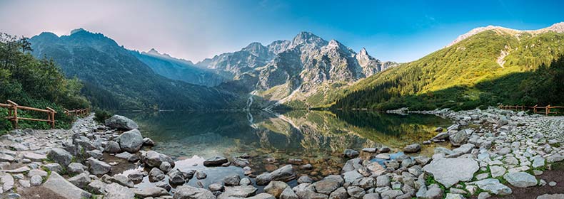 view of mountains lakes and fields at tatra national park in poland