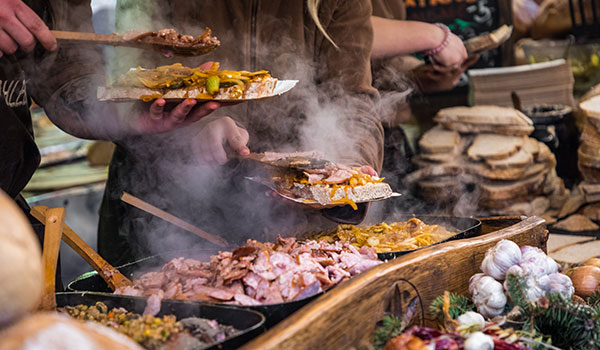 traditional polish street food being served at a market in krakow poland