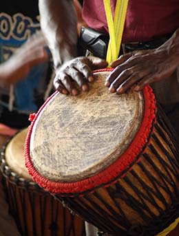 man playing drums at the sauti za busara festival in zanzibar tanzania