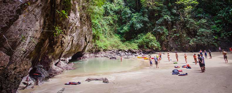 Once you are through the short cave tunnel a small lagoon awaits you on Emerald Beach