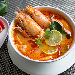 a bowl of traditional shrimp soup in Thailand