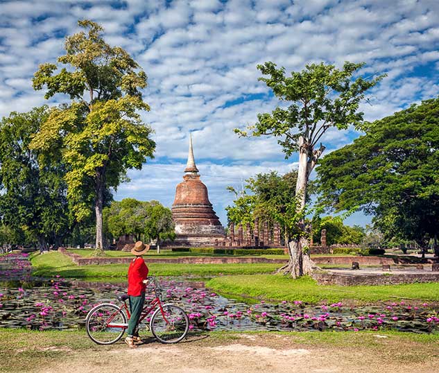 visiting Sukhothai historical park on a Tucan Travel tour