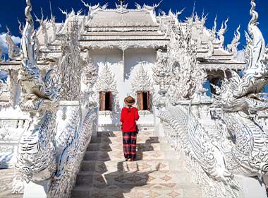 visit the Wat Rong Khun temple in Thailand