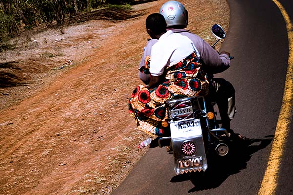 travelling by boda boda motorcycle in uganda