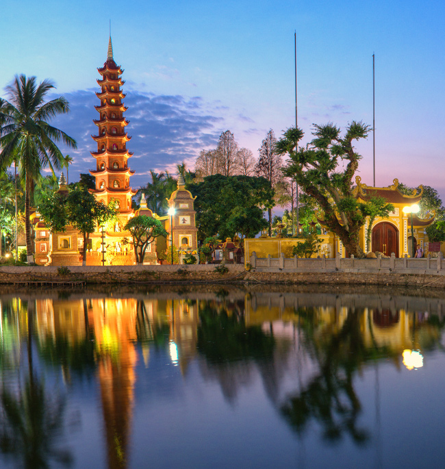 Explore the lakeside of Ho Tay for incredible city views reflected in the water