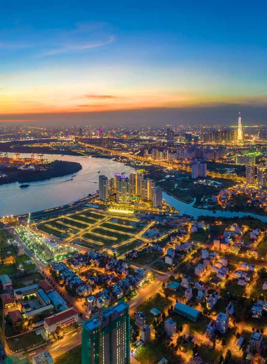 bho chi minh city landscape and saigon rier flowing through the city buildings