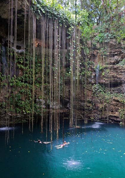 swimming in caves in mexico Ik-Kil cenote near Chichen Itza, Mexico