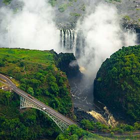 view of victoria falls and bridge in zimbabwe