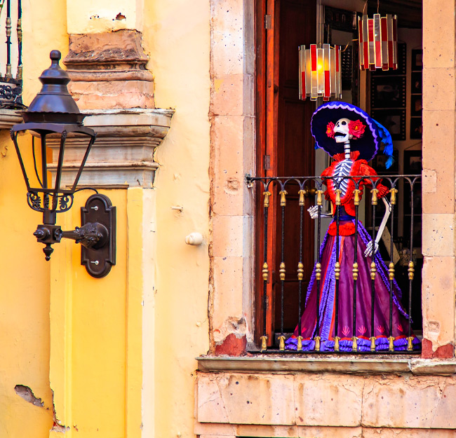 Enjoy the festivities of Dia de los Muertos on the streets of Oaxaca