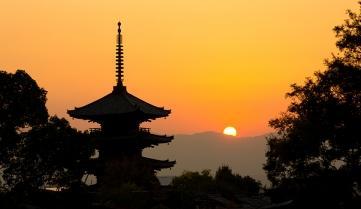 The sun setting over Kyoto, Japan