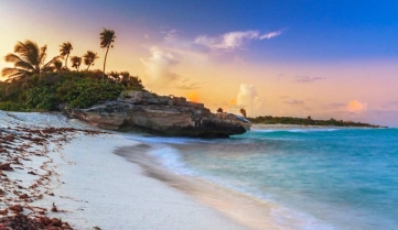 Playa del Carmen beach at sunset.